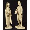 Image 1 : Pair of carved ivory figures, a lady and gentleman clutching implements, 13cm high