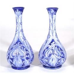Pair of Moorcroft McIntyre baluster shape florianware vases, hand painted and tubelined with blue fl