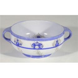 Twin handled Moorcroft bowl, hand painted and tubelined with blue and grey peacock feathers onto a l