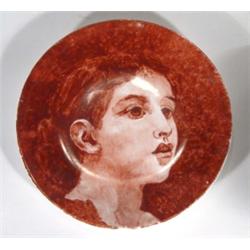 Minton porcelain plate, hand painted in reds with a young woman, impressed mark to base, 26cm diamet