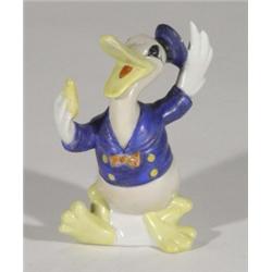 Hand painted Maw of London Walt Disney Donald Duck toothbrush holder, marks to base, 11cm high