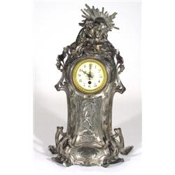 Unusual large Art Nouveau silver plated mantelclock, modelled as Madonna holding a child and panels