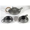 Three piece Libertys Art Nouveau pewter teaset, designed by Archibald Knox, embossed with stylised m