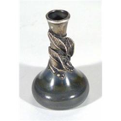 Iridescent Art Nouveau style bottle vase with unmarked silver mount, relief moulded with leaves, 9cm