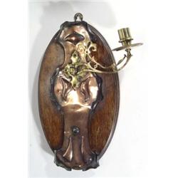 Oval oak mounted copper and brass Arts and Crafts style wall sconce, 38cm high