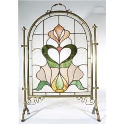 Art Nouveau brass framed firescreen with floral design coloured leaded glazed panels