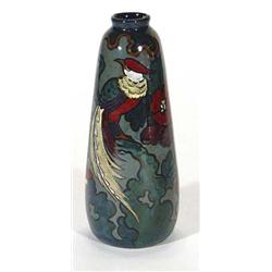 Decoro pottery vase, hand painted with a stylised parrot amongst flowers and leaves, marks to base,
