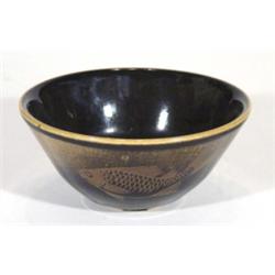 Royal Copenhagen pottery bowl, decorated with fish onto a brown and black ground, marks to base, 18c