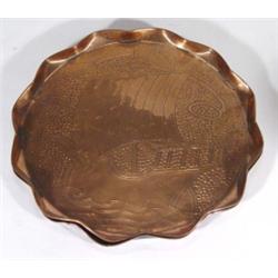 Pair of fluted Arts and Crafts style copper trays, decorated with stylised galleons onto a hammered