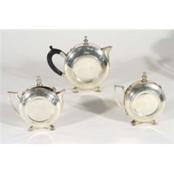 Circular silver plated three piece Art Deco style flat sided teaset, largest 18cm high