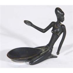 Small Austrian bronze figure of a kneeling African woman in the style of Hageneur, marks to base, 10