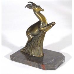 Bronzed metal Art Deco leaping stag on a marble base, 18cm high