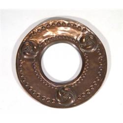 Circular Art Nouveau style copper frame, embossed with stylised flowers, 18cm diameter