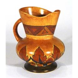 Hand painted Clews Chameleonware jug, decorated with a brown flame pattern onto a mottled brown grou