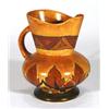 Image 1 : Hand painted Clews Chameleonware jug, decorated with a brown flame pattern onto a mottled brown grou