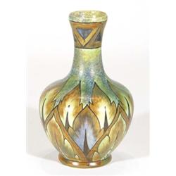 Hand painted Clews Chameleonware vase, painted with a brown flame pattern onto a mottled green and b