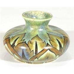 Hand painted Clews Chameleonware squat vase, decorated with a flame pattern onto a mottled blue and