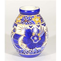 Hand painted Clews Chameleonware ovoid vase, decorated with blue and orange flowers onto a cream gro
