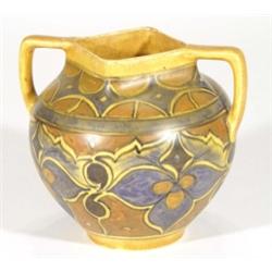 Hand painted Clews Chameleonware twin handled vase, decorated with a band of brown and blue flowers