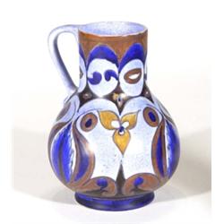 Hand painted Clews Chameleonware single handled vase, decorated with brown and blue leaves and flowe