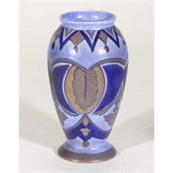 Hand painted Clews Chameleonware vase, decorated with brown leaves onto a mottled blue ground, marks