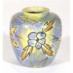 Hand painted Clews Chameleonware small vase, decorated with brown and blue flowers and leaves onto a