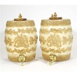 Pair of 19th century Doulton & Watts stoneware spirit barrels, relief moulded with bands of leaves,