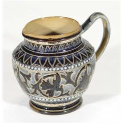 Doulton Lambeth stoneware jug with incised band of stylised leaf decoration, impressed marks and ini
