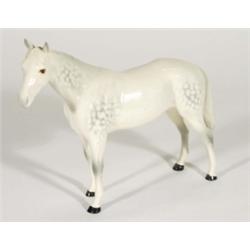 Hand painted Royal Doulton grey dappled horse, marks to base, 22cm high
