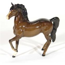 Hand painted Royal Doulton brown glazed horse,  marks to base, 20cm high