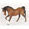 Hand painted Royal Doulton matt glazed brown and black horse, marks to base, 20cm high