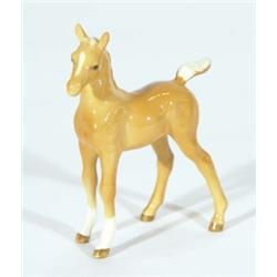 Hand painted Royal Doulton tan glazed foal, marks to base, 12cm high