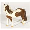 Hand painted Beswick matt glazed brown and white horse with tan feet, marks to base, 18cm high