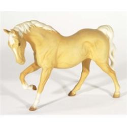 Hand painted Beswick matt glazed tan horse, marks to base, 20cm high