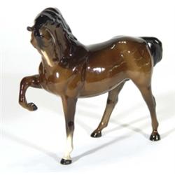 Hand painted Beswick brown glazed horse, marks to base, 19cm high