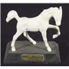 Image 1 : White glazed Beswick 'Springtime Foal' on a black base, marks to base, 14cm high