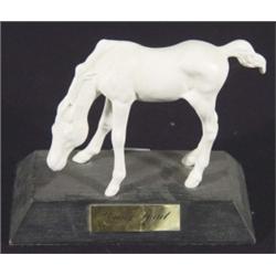 White glazed Beswick 'Young Spirit' foal on a black base, marks to base, 12cm high
