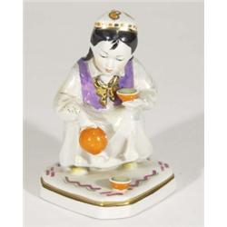 Hand painted USSR young girl pouring tea decorated with a lustre glaze, marks to base, 16cm high