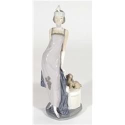Hand painted Lladro figurine of a 1920s lady in a flowing dress beside a dog, marks to base, 35cm hi