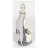 Hand painted Lladro figurine of a 1920s lady in a flowing dress beside a dog, marks to base, 35cm hi