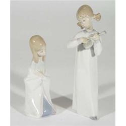 Hand painted Lladro figurine playing a violin and a Lladro figurine in a shawl, marks to bases, larg