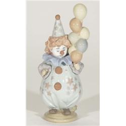 Hand painted Lladro depressed clown figure, marks to base, 20cm high