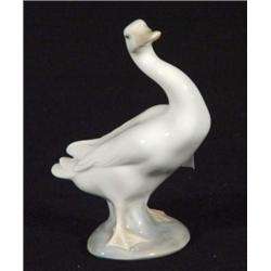 Hand painted Lladro goose with raised head, marks to base, 13cm high