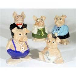 Set of five hand painted Wade Natwest pig moneybanks, largest 19cm high