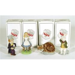 Four boxed hand painted Wade 'Alice in Wonderland' collector's figures, marks to bases, largest 12cm