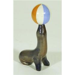Early hand painted Wade seal balancing a ball corkscrew, 17cm high