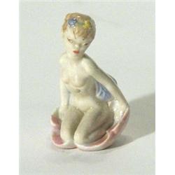 Hand painted Wade 'Pex Nylons Fairy' with blue wings, label to back, 5cm high