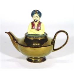 Copper lustre and hand painted Wade 'Genie' teapot, marks to base, 25cm high