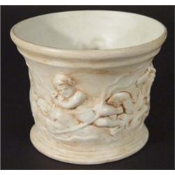 Bretby Art Pottery planter, relief moulded with a band of cherubs riding horses and sea serpents, im