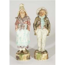 Pair of Continental pottery figures of a lady and gentleman, 32cm high